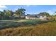 Spacious backyard with grassy area and wooden fence at 527 Sunrise Dr, Orlando, FL 32803