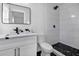 Modern bathroom with white vanity and walk-in shower at 527 Sunrise Dr, Orlando, FL 32803
