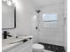Modern bathroom with walk in shower and window at 527 Sunrise Dr, Orlando, FL 32803