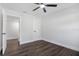 Spacious bedroom with wood-look floors and access to another room at 527 Sunrise Dr, Orlando, FL 32803