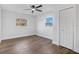 Bedroom with hardwood floors and closet at 527 Sunrise Dr, Orlando, FL 32803