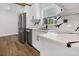 Modern kitchen with stainless steel appliances and quartz countertops at 527 Sunrise Dr, Orlando, FL 32803