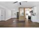 Open concept kitchen with stainless steel appliances and a breakfast bar at 527 Sunrise Dr, Orlando, FL 32803