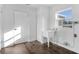 Laundry room with utility sink and built-in shelving at 527 Sunrise Dr, Orlando, FL 32803
