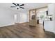 Bright living room with hardwood floors and kitchen view at 527 Sunrise Dr, Orlando, FL 32803