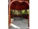 Gazebo interior with wicker seating and a small table at 8910 Legacy Ct # 206, Kissimmee, FL 34747