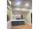 Community wet bar with sleek cabinetry and countertop at 8910 Legacy Ct # 206, Kissimmee, FL 34747
