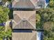 Aerial view of the house's roof and backyard. Shows the home's size and lawn space at 9026 Dry Creek Ln, Orlando, FL 32832