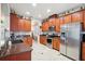 Modern kitchen with stainless steel appliances and granite countertops at 9026 Dry Creek Ln, Orlando, FL 32832