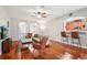 Spacious living room features hardwood floors, comfortable seating, and an open floor plan at 9026 Dry Creek Ln, Orlando, FL 32832