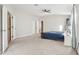 Bright main bedroom with en-suite bathroom and ample closet space at 9026 Dry Creek Ln, Orlando, FL 32832