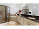 Spa-like bathroom with a walk-in shower, soaking tub, and double vanity at 972 Ladera Ranch Rd, Kissimmee, FL 34759