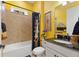 Charming bathroom with tub shower combo, and updated vanity at 972 Ladera Ranch Rd, Kissimmee, FL 34759