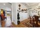 Elegant dining room featuring hardwood floors and a view into the living room at 972 Ladera Ranch Rd, Kissimmee, FL 34759