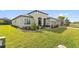 Single-story house with attractive landscaping and curb appeal at 972 Ladera Ranch Rd, Kissimmee, FL 34759