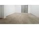 Spacious bedroom with neutral colored carpet and window at 102 Lake Tracy Ct, Haines City, FL 33844