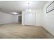 Spacious dining room with carpeting and a chandelier at 102 Lake Tracy Ct, Haines City, FL 33844