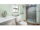 Updated bathroom with a walk-in shower and modern vanity at 1109 Lakeshore Blvd, St Cloud, FL 34769