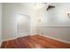 Charming bedroom with hardwood floors and an ensuite bathroom at 1109 Lakeshore Blvd, St Cloud, FL 34769