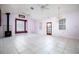 Spacious bedroom with tile floors and ceiling fan at 1109 Lakeshore Blvd, St Cloud, FL 34769