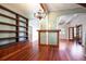 Dining room featuring hardwood floors and built-in shelving at 1109 Lakeshore Blvd, St Cloud, FL 34769