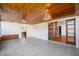 Bright sunroom with tile floors and access to the kitchen at 1109 Lakeshore Blvd, St Cloud, FL 34769