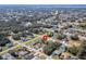 Aerial perspective of the property and surrounding area at 1603 Tench Ct, Kissimmee, FL 34759