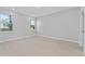 Empty bedroom with neutral walls and tile floors at 1603 Tench Ct, Kissimmee, FL 34759