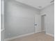 Simple bedroom with neutral walls and tile flooring at 1603 Tench Ct, Kissimmee, FL 34759
