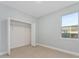 Bright bedroom with closet and window, offering natural light at 1603 Tench Ct, Kissimmee, FL 34759