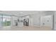 Modern kitchen with white cabinets, stainless steel appliances, and an island at 1603 Tench Ct, Kissimmee, FL 34759