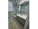 Bathroom with single sink vanity, toilet and shower/tub combo at 2778 Almaton Loop # 303, Kissimmee, FL 34747