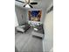 Bedroom with two twin beds, Mickey Mouse decor and wood-look floors at 2778 Almaton Loop # 303, Kissimmee, FL 34747