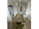 Dining area with wood table and chairs, offering a bright and airy feel at 2778 Almaton Loop # 303, Kissimmee, FL 34747
