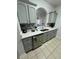 Modern kitchen with stainless steel appliances and gray cabinets at 2778 Almaton Loop # 303, Kissimmee, FL 34747