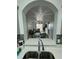 View of kitchen sink and countertops, with a glimpse into the dining and living areas at 2778 Almaton Loop # 303, Kissimmee, FL 34747