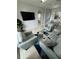 Living area featuring comfy gray sofas and a geometric rug at 2778 Almaton Loop # 303, Kissimmee, FL 34747