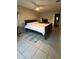 Bright bedroom with tiled floors and a comfortable-looking bed at 453 Hunter Circle, Kissimmee, FL 34758