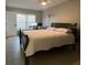 Spacious bedroom with a double bed and plenty of natural light at 453 Hunter Circle, Kissimmee, FL 34758