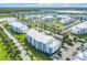 Aerial view of community with multiple buildings at 4741 Clock Tower Dr # 205, Kissimmee, FL 34746