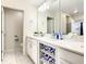 Clean bathroom with double vanity and plenty of storage at 4741 Clock Tower Dr # 205, Kissimmee, FL 34746
