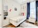 Nautical-themed bedroom with twin-size bed and full-size mirror at 4741 Clock Tower Dr # 205, Kissimmee, FL 34746