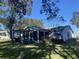 Spacious backyard with patio and pergola at 5062 El Destino Dr, Leesburg, FL 34748