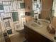 Bathroom with a shower/tub combo and wood vanity at 5062 El Destino Dr, Leesburg, FL 34748