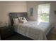 Bedroom with a double bed and nightstand at 5062 El Destino Dr, Leesburg, FL 34748