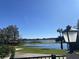 Scenic view of a lake with lush landscape at 5062 El Destino Dr, Leesburg, FL 34748