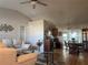 Bright living room features hardwood floors, neutral walls, and an open floor plan at 5062 El Destino Dr, Leesburg, FL 34748