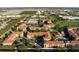Aerial view of apartment complex showcasing its layout and amenities at 902 Charo Pkwy # 636, Davenport, FL 33897