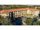 Aerial view of apartment community with pool and parking at 902 Charo Pkwy # 636, Davenport, FL 33897