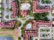 Bird's-eye view of community with multiple buildings and pools at 636 Charo Pkwy # 636, Davenport, FL 33897